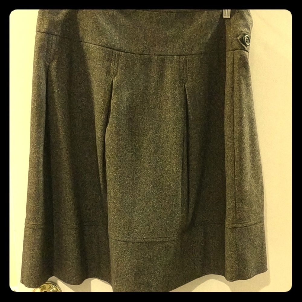 Pleated midi length brown wool skirt